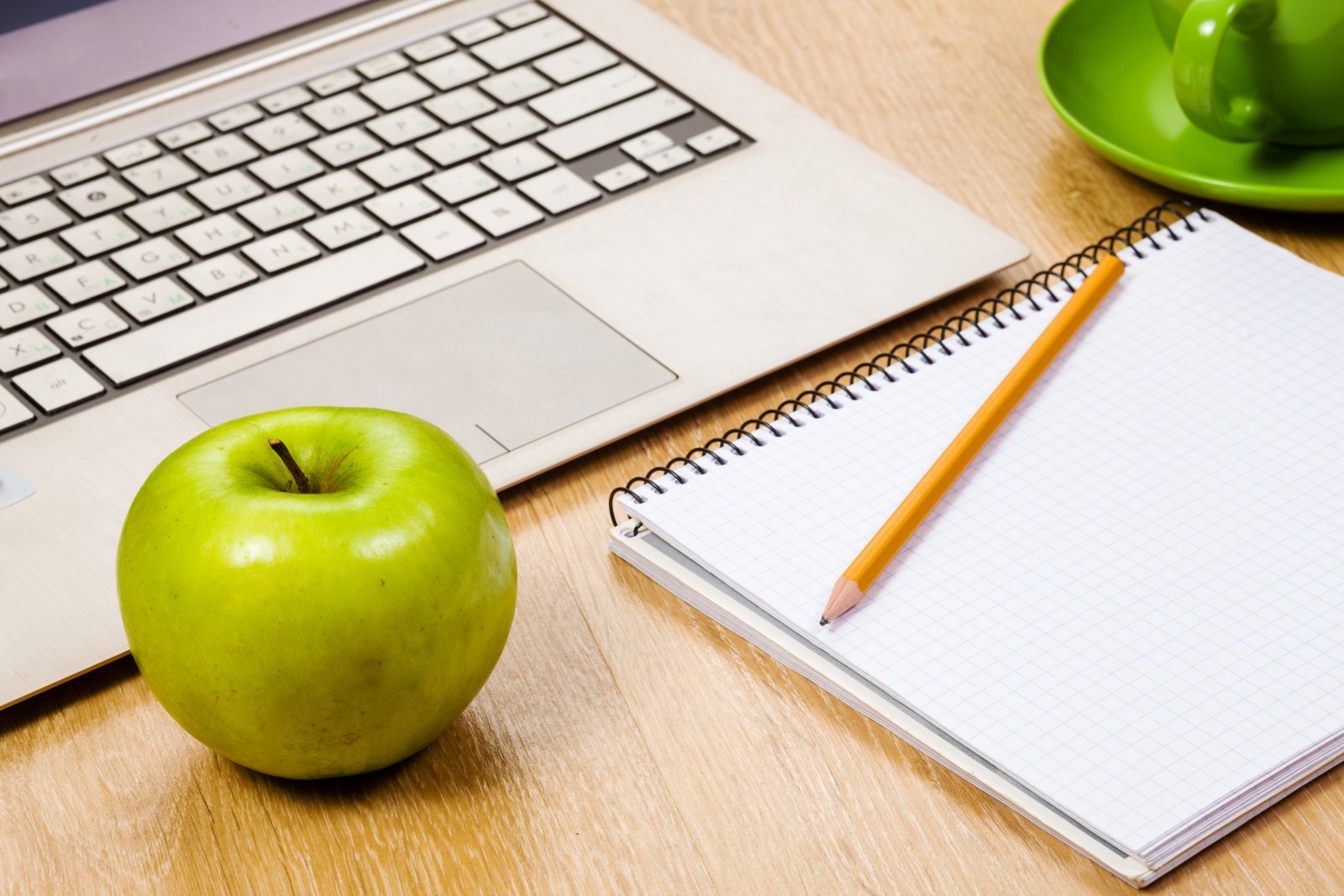 laptop notepad pencil apple on wooden desk 2026 09 25 02 30 58 utc